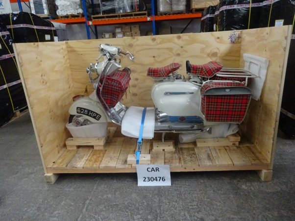 A 1958 Lambretta MK 3 LD during the crating process at Autoshippers before being shipped to the USA