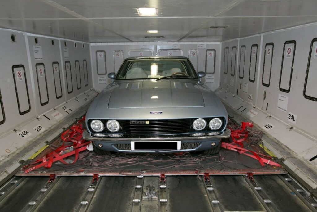 Jensen Interceptor loaded into the cargo bay of an aircraft for shipping to Dubai from the UK by airfreight