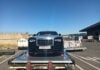 2019 Rolls Royce Dawn in Black and Grey loaded onto an aircraft pallet after arrival at Johannesburg airport after shipping from the UK.