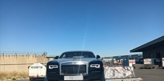 2019 Rolls Royce Dawn in Black and Grey loaded onto an aircraft pallet after arrival at Johannesburg airport after shipping from the UK.